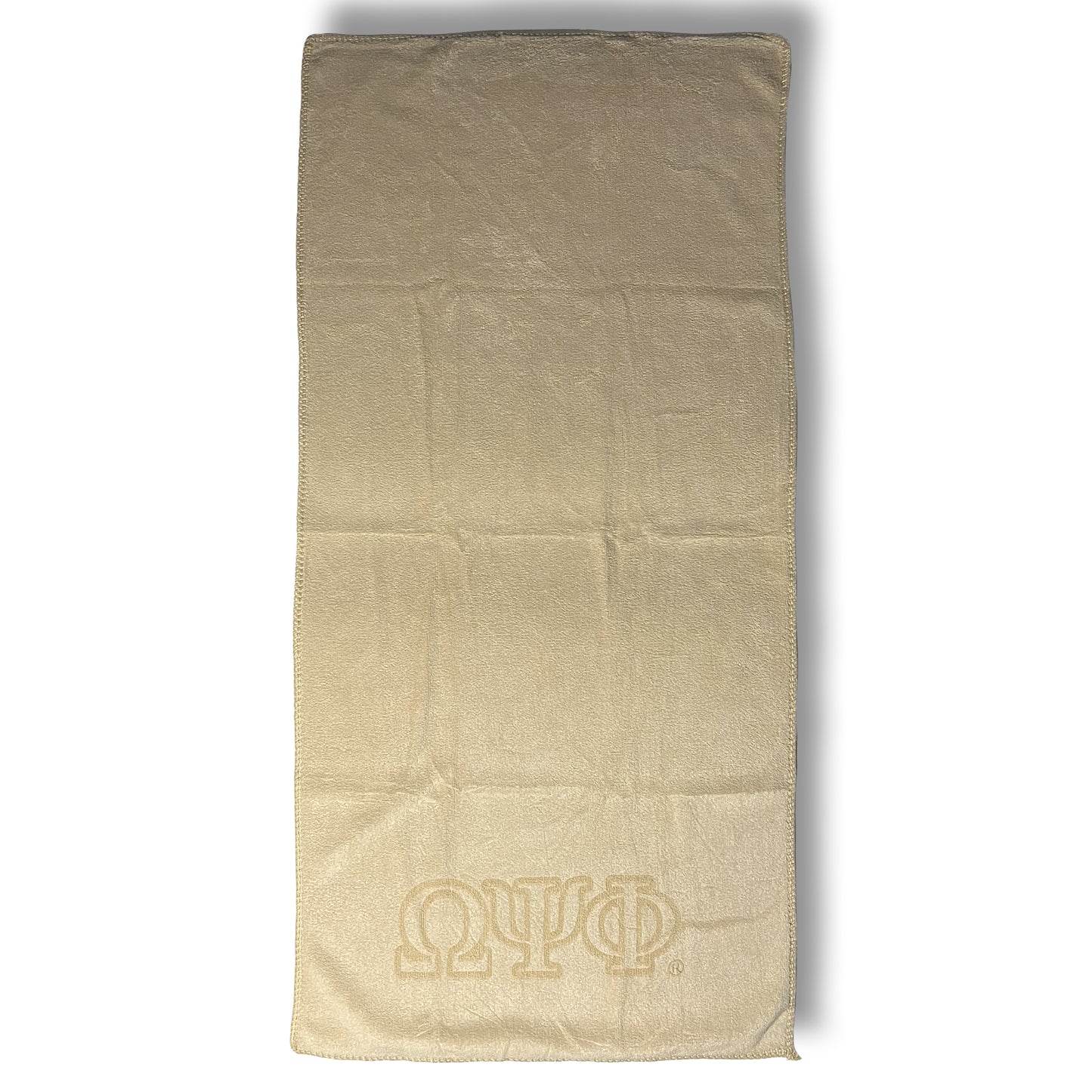 Old Gold towel with Omega Psi Phi logo on a white background