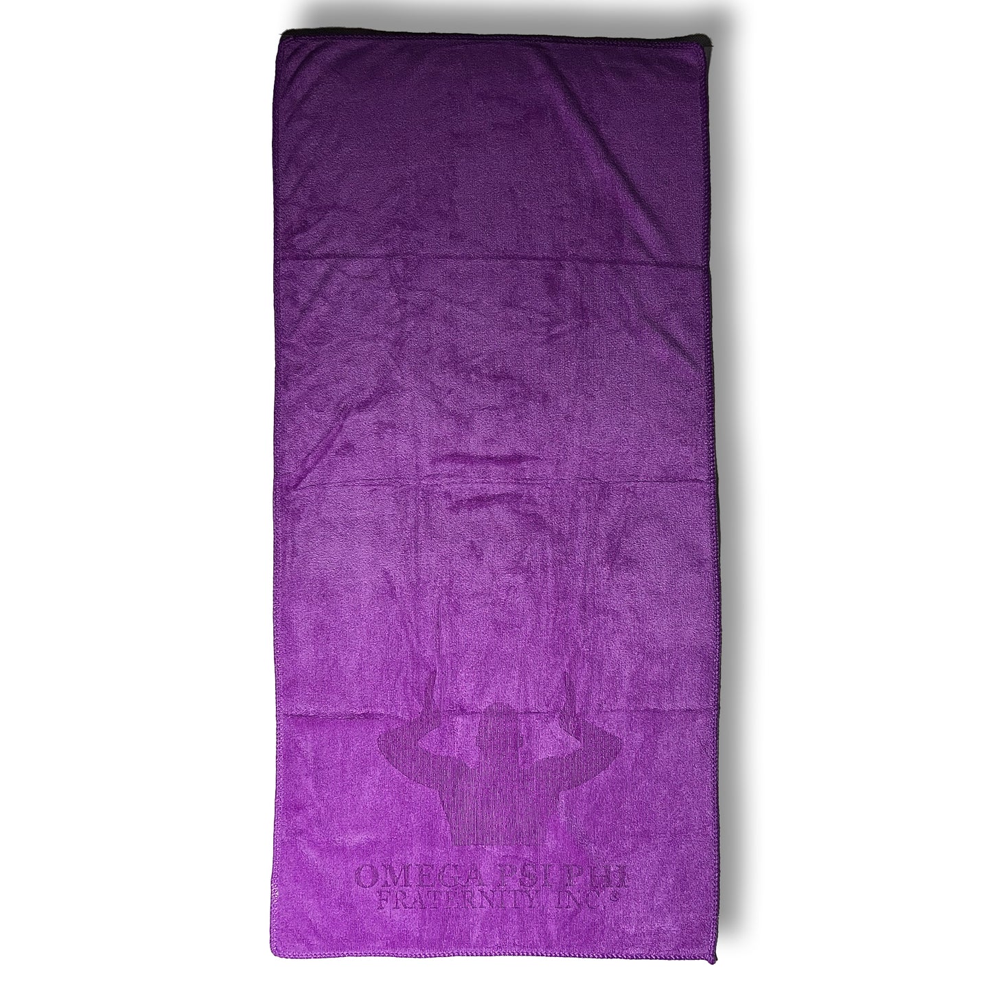Purple towel with Omega Psi Phi Fraternity Inc logo on a white background