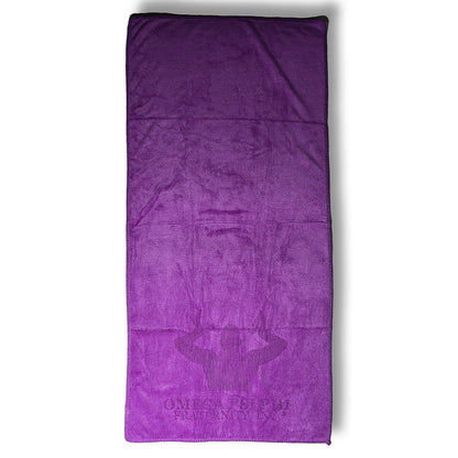 Purple towel with Omega Psi Phi Fraternity Inc logo on a white background