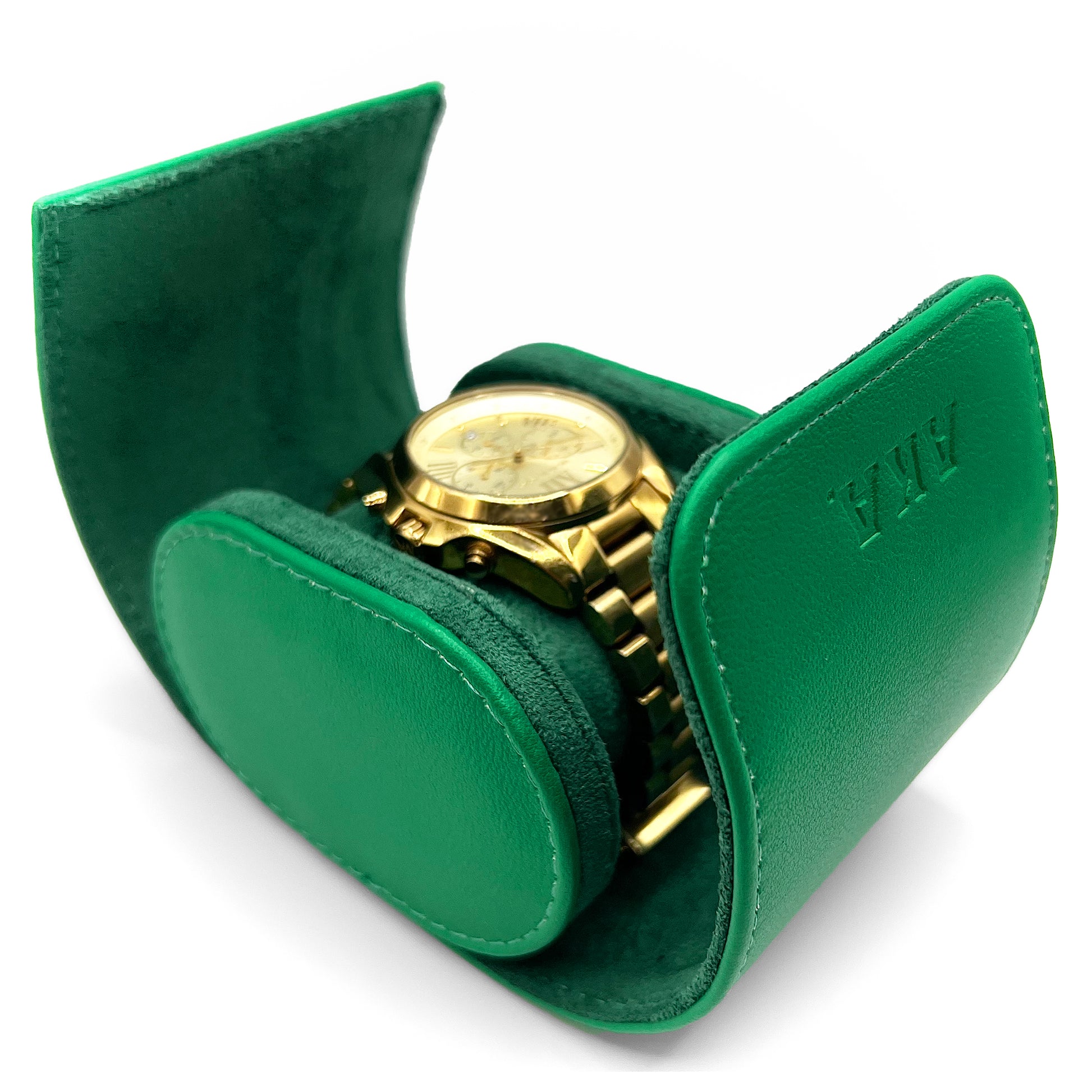 Gold watch in a green leather case on a white background