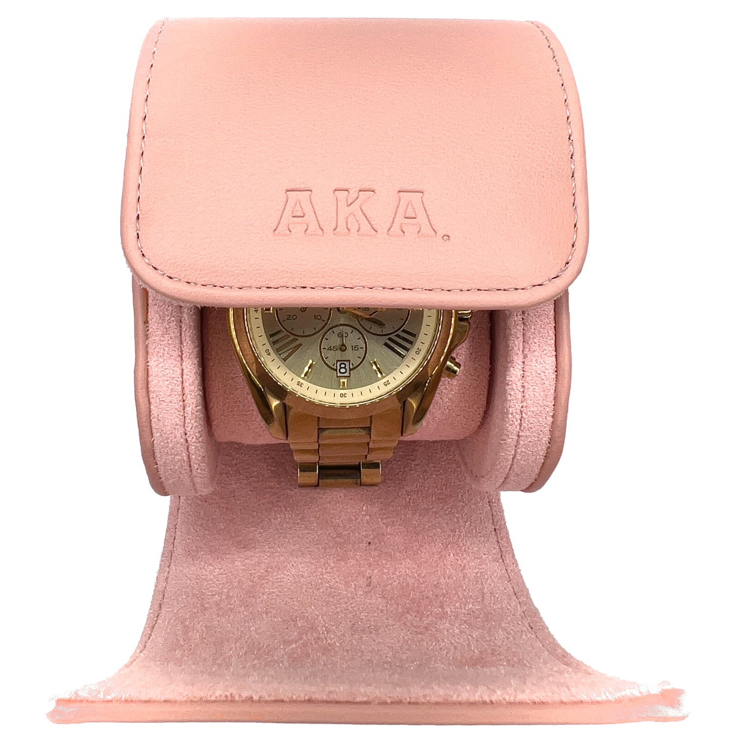 Pink watch holder with a gold watch inside, featuring the brand 'AKA'.