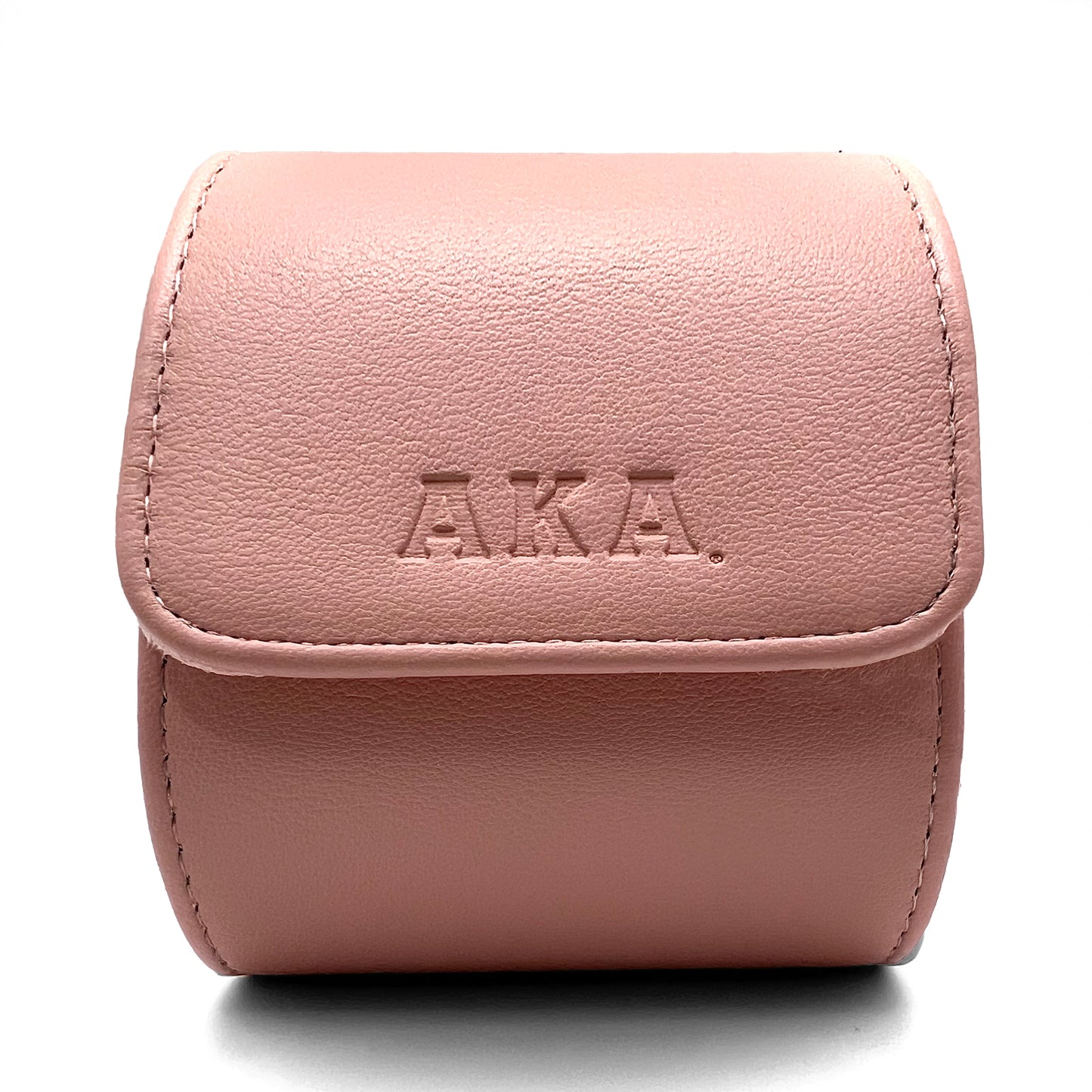 Pink leather case with 'A.K.A.' branding on a white background