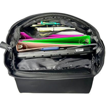 Open-top view of backpack, showcasing the space inside. Backpack is holding 3 binders, 2 notebooks, several pens in a zipper pocket, and a 17 inch laptop in the padded laptop section.